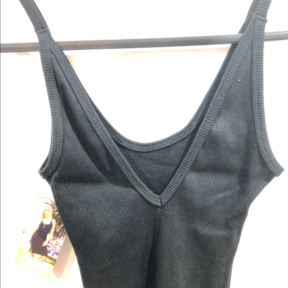 Bright new Black mini one piece dress. SizeS